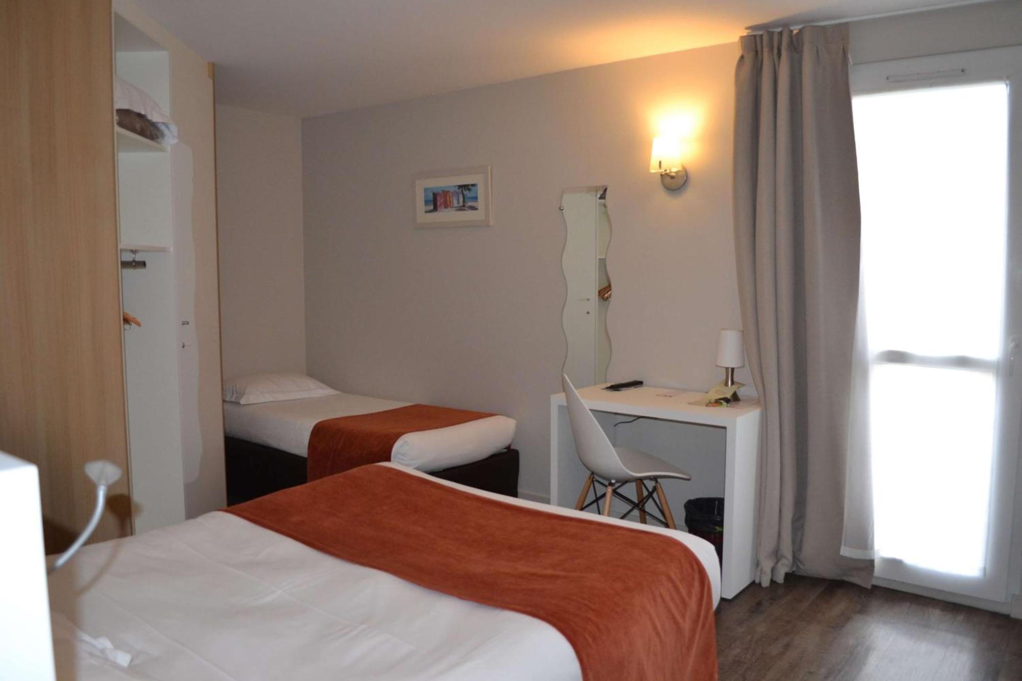 Brit Hotel Les Alizes Порник Экстерьер фото