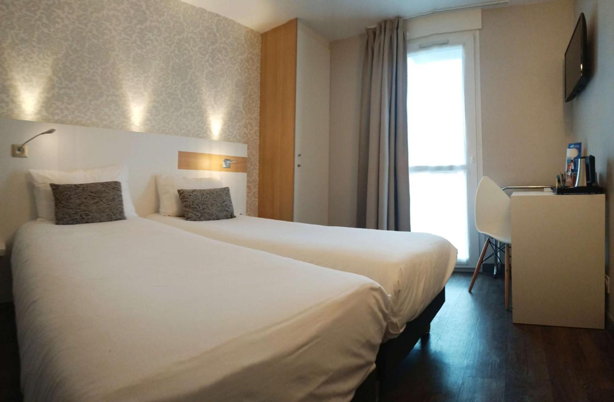 Brit Hotel Les Alizes Порник Экстерьер фото