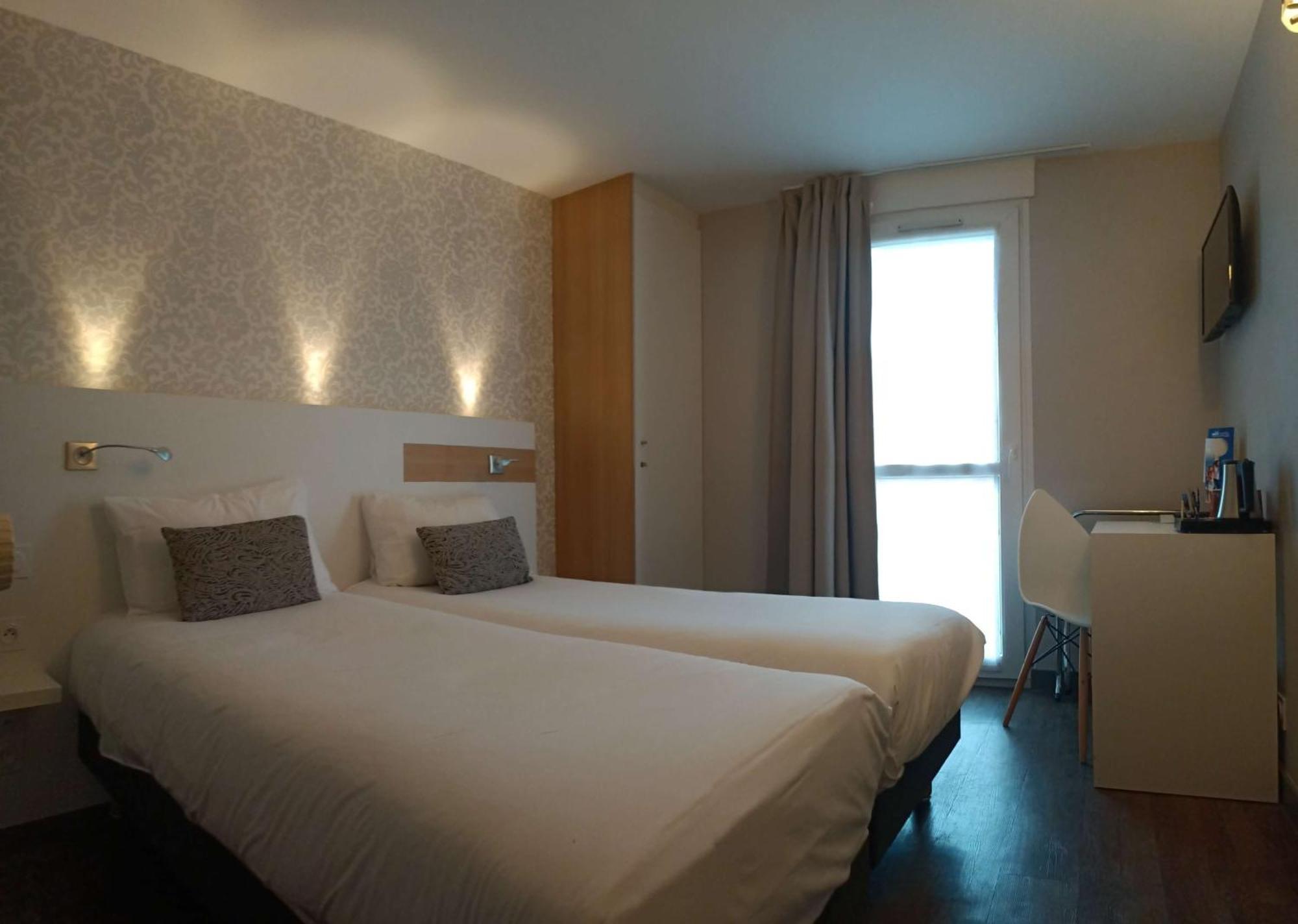 Brit Hotel Les Alizes Порник Экстерьер фото
